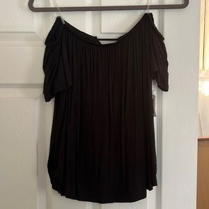 Off the shoulder, open back black shirt from Charlotte Russe
